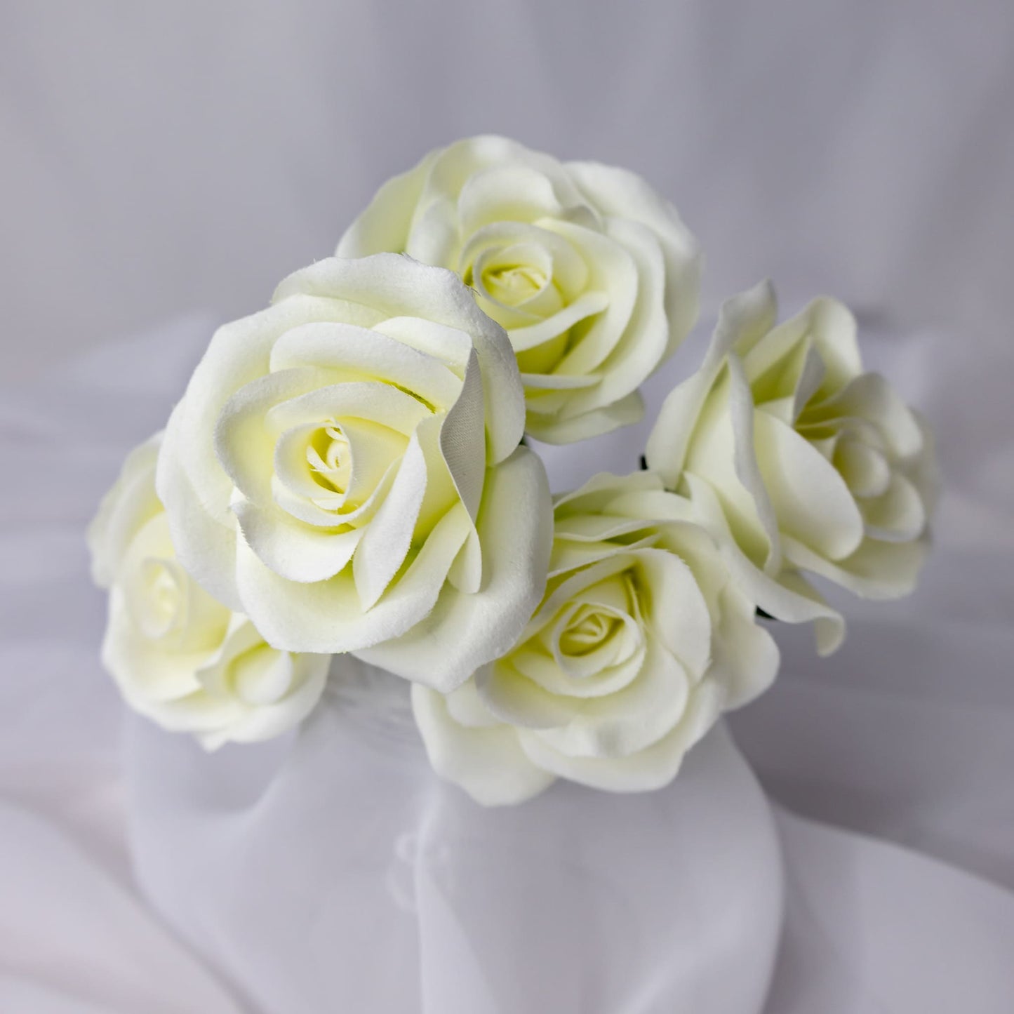 artificial white velveeten roses top view