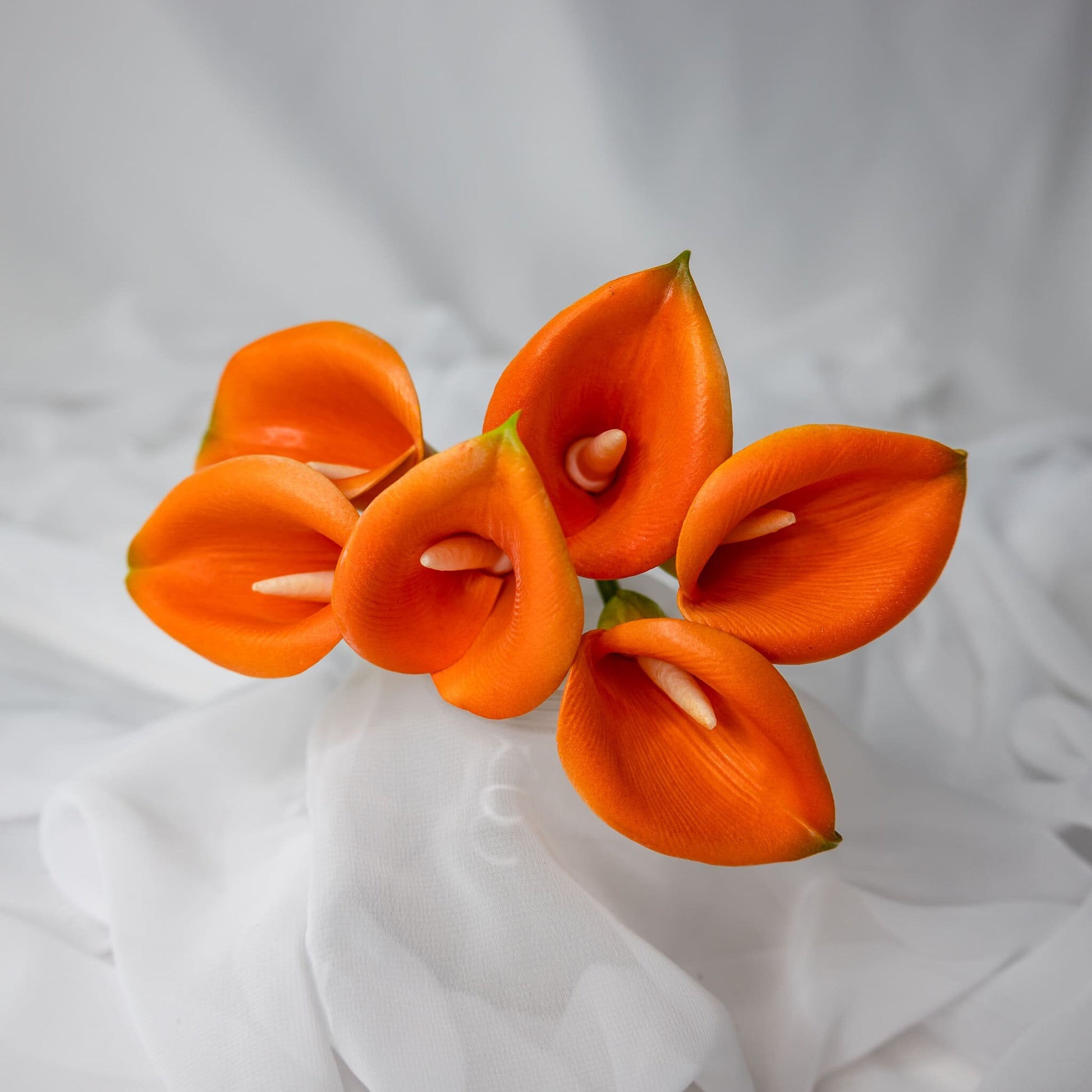 artificial Orange Buttonhole Calla Lilies top view