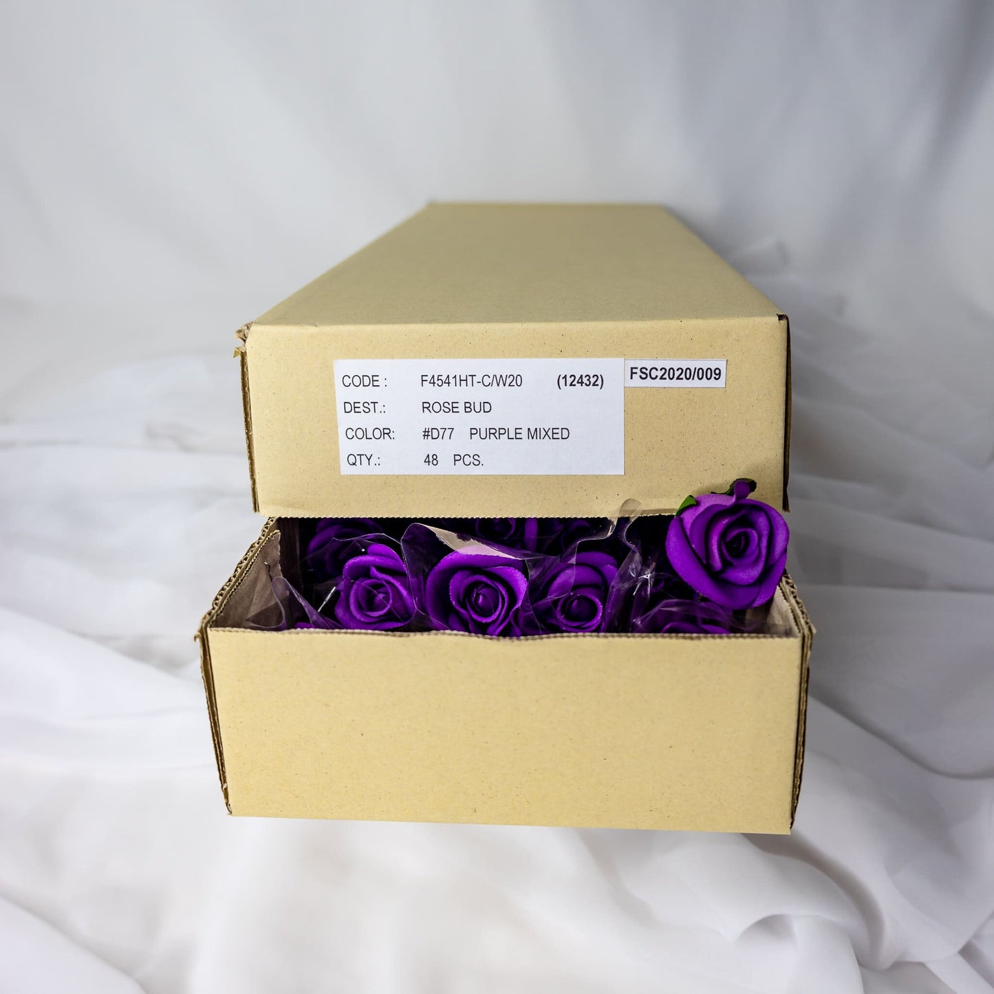 artificial Purple Velveteen rose Buds inside the box
