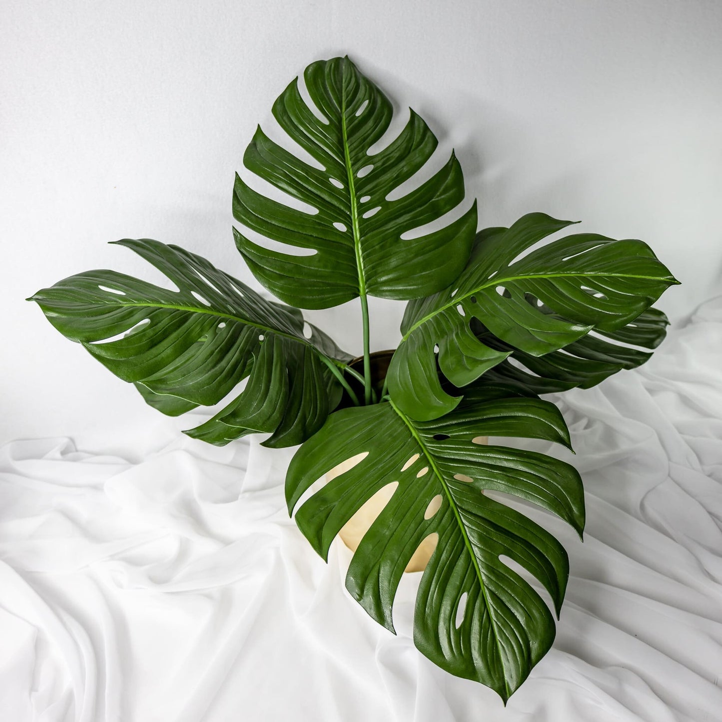 artificial Large Monstera Leaves in gold vase