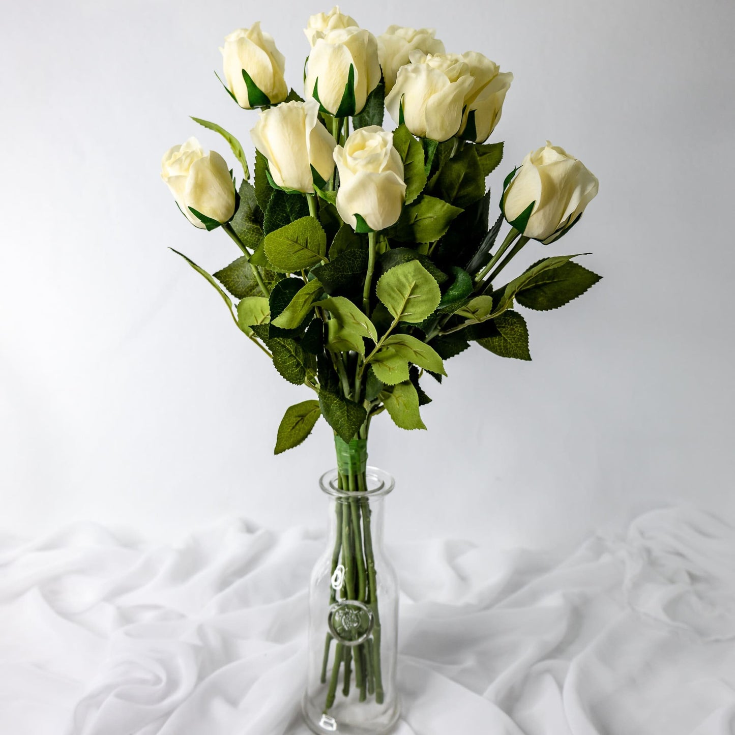 Artificial Cream Real Touch Rose Open Bud in glass vase