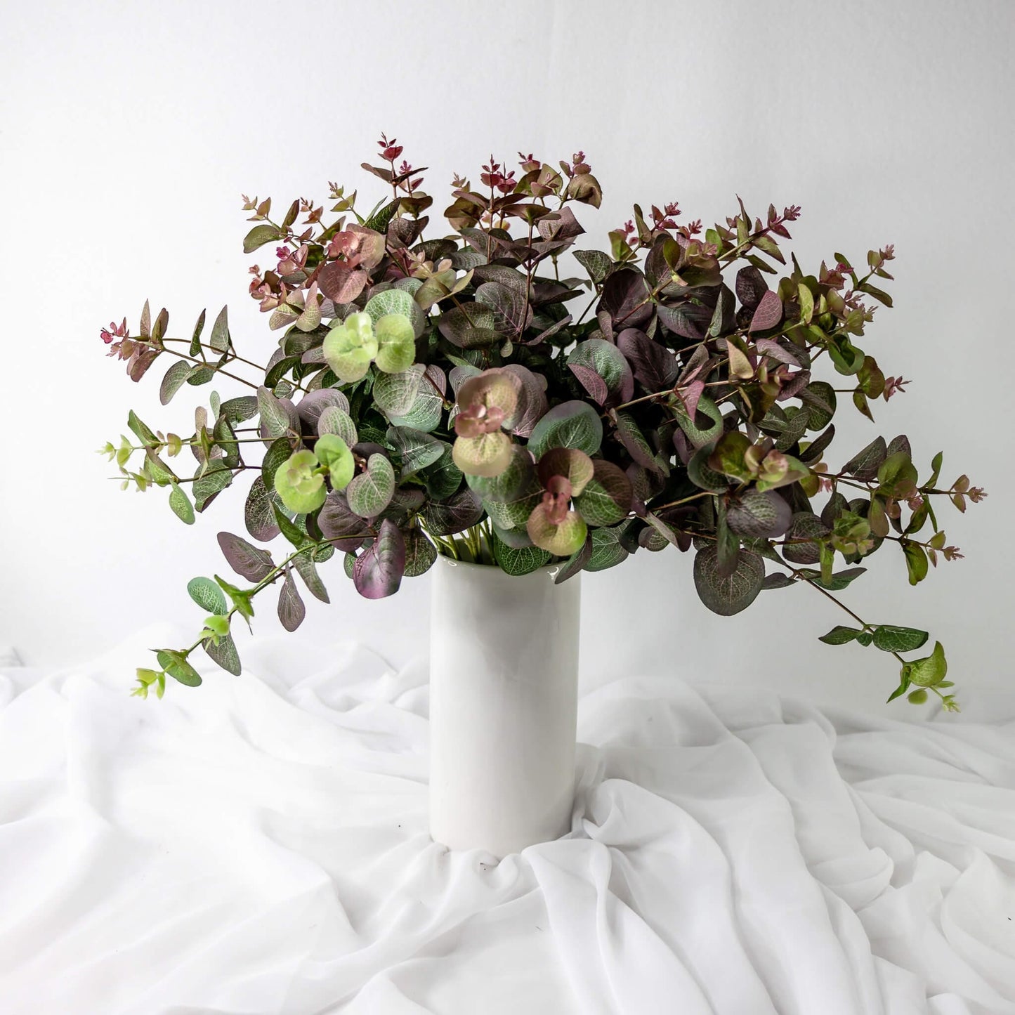 artificial Burgundy Felt Gum in white vase