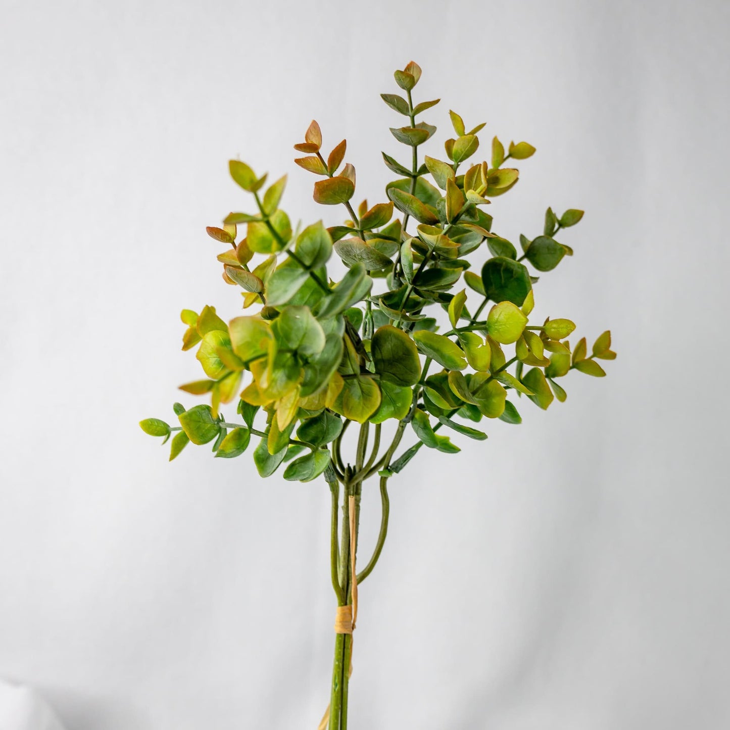 artificial Gold Short Mini Gum Green in white vase