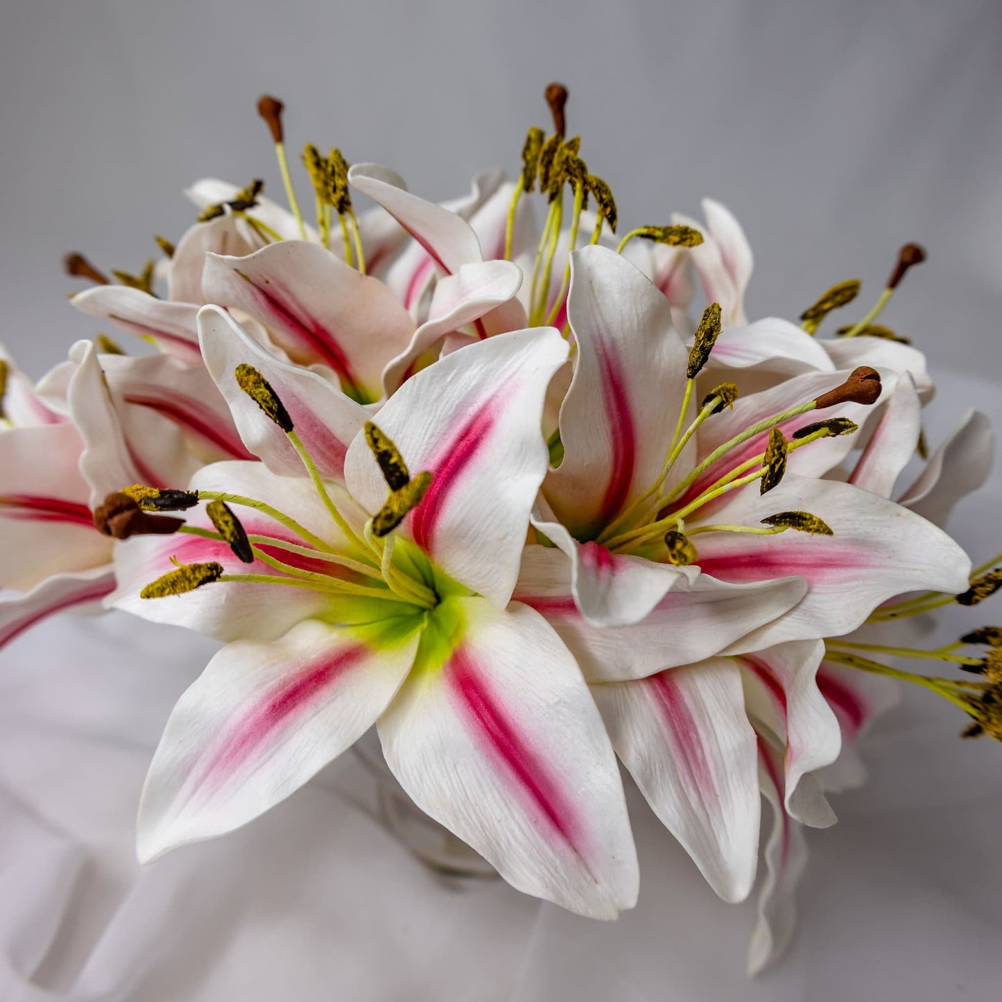 artificial White/Pink Stripe Asiatic Lily Flowerhead in glass vase