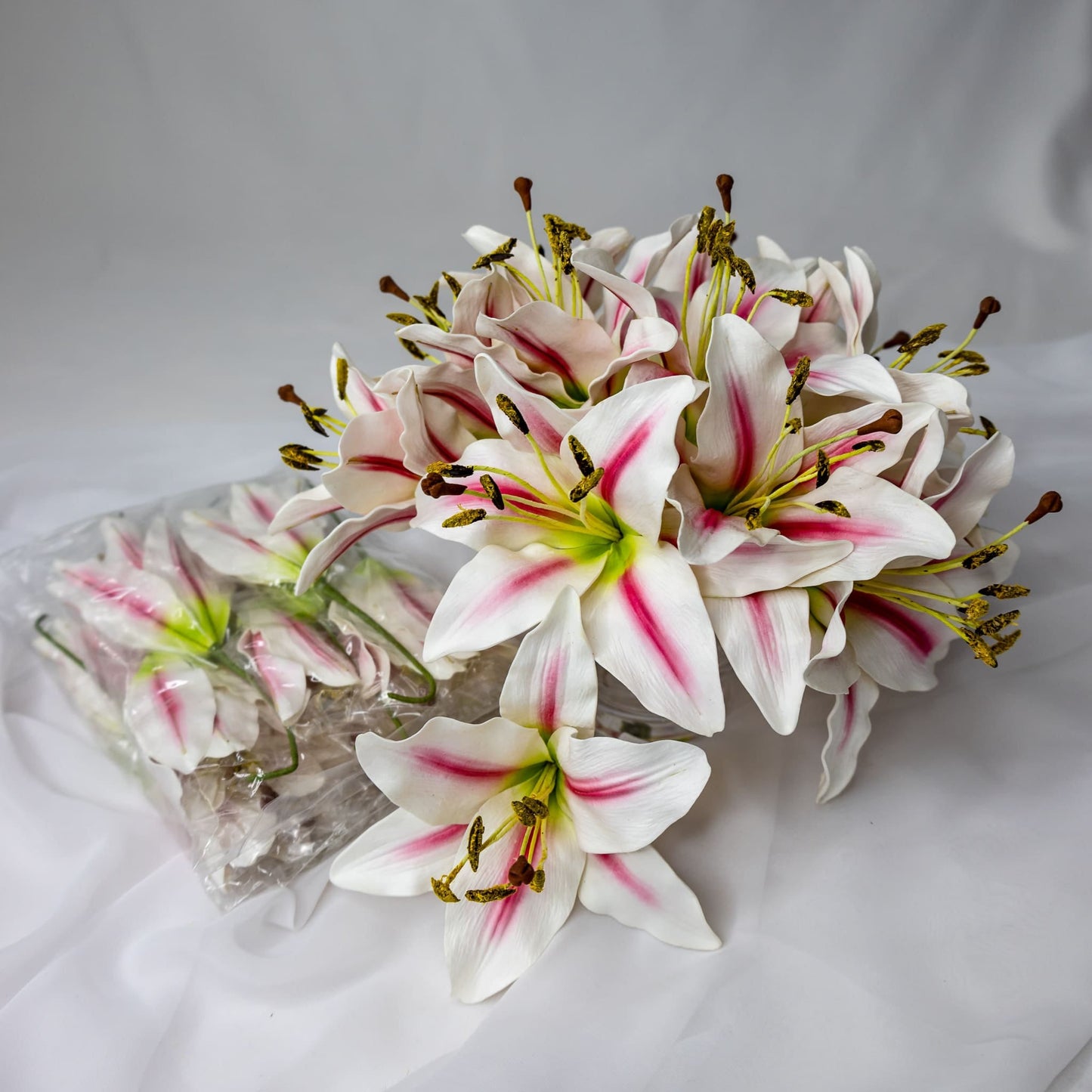 artificial White/Pink Stripe Asiatic Lily Flowerhead in glass vase