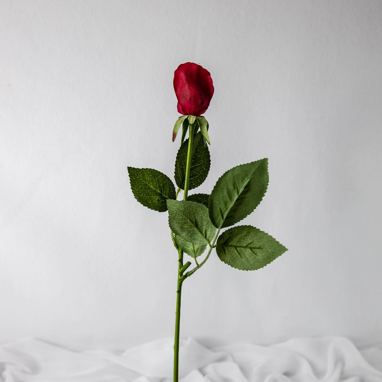 artificial red rose bud