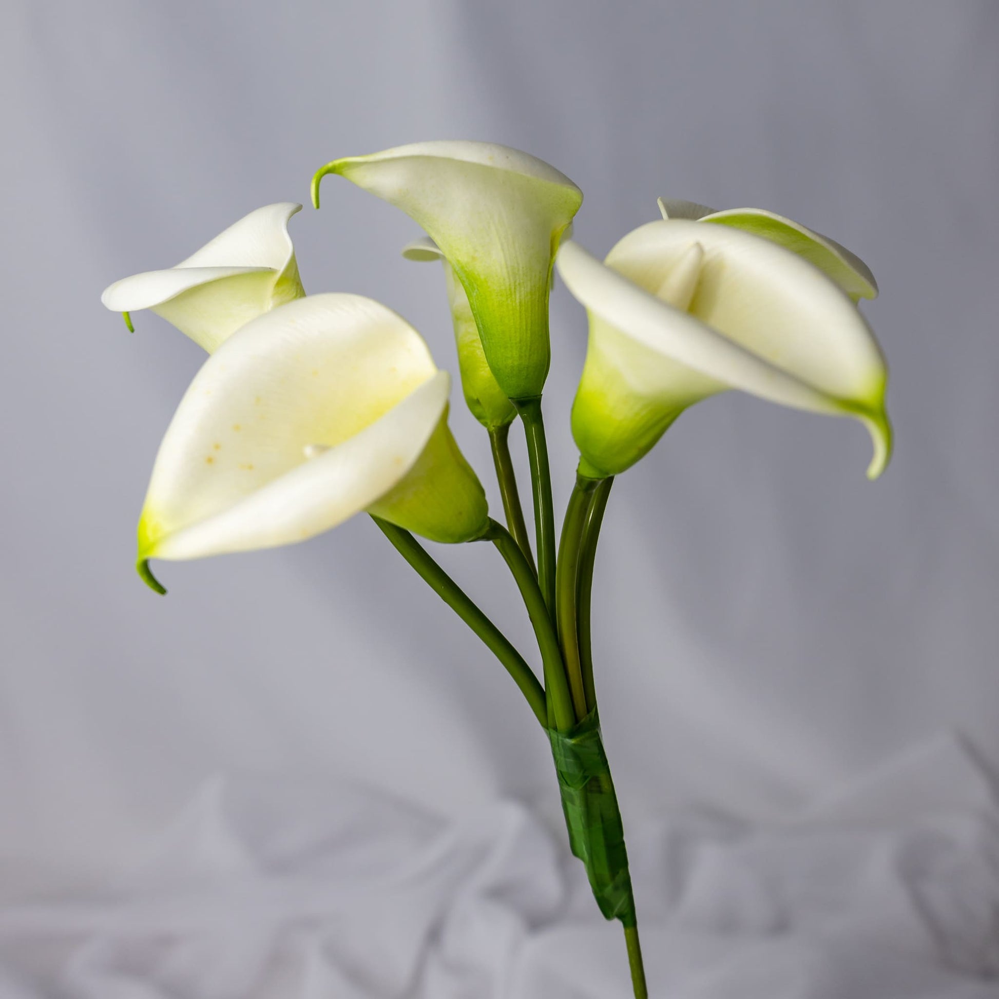 artificial white buttonhole calla lilies