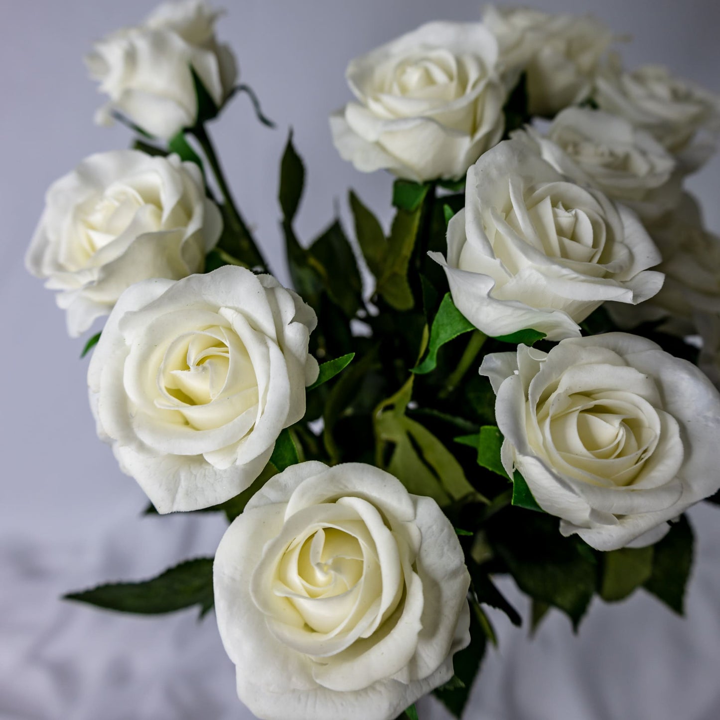 artificial white half bloom roses top view