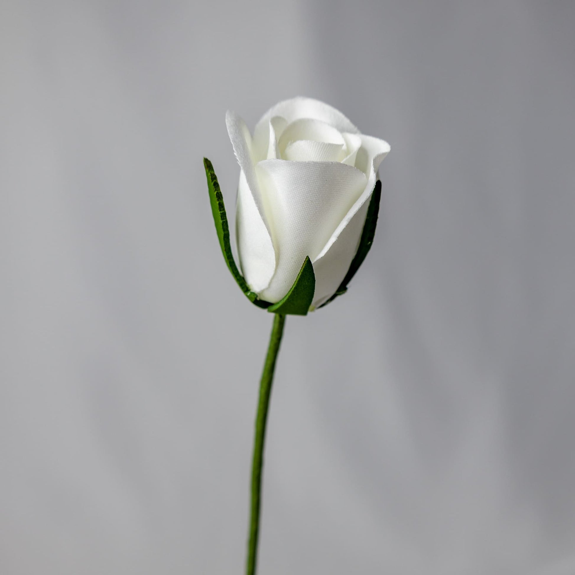 artificial white velveeten rose bud
