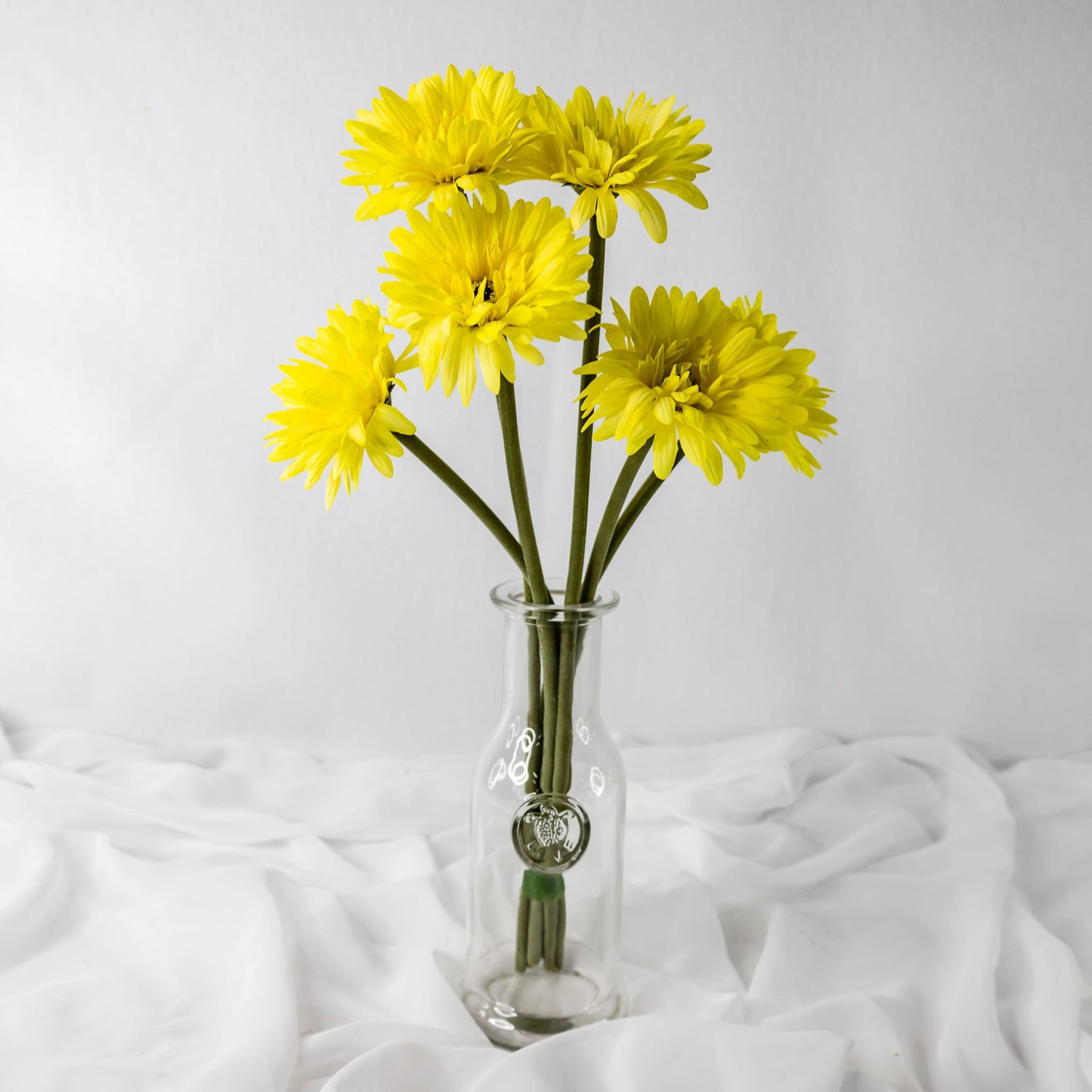 artificial Yellow Gerbera in glass vase