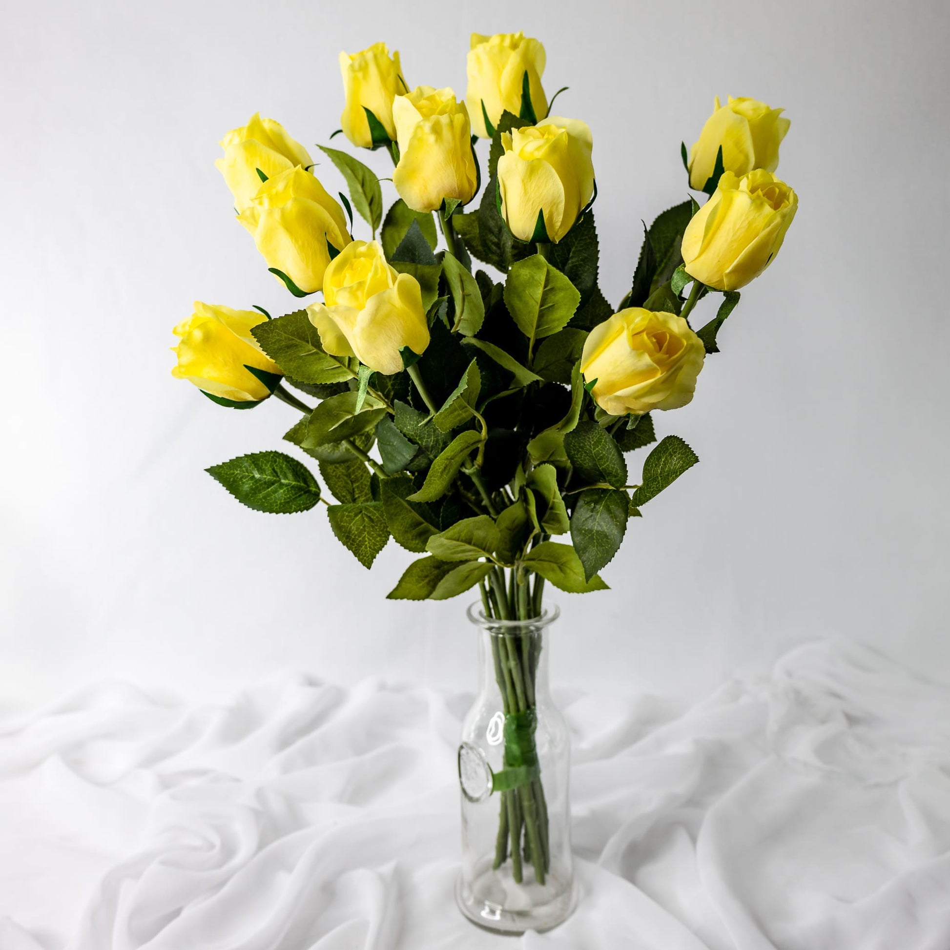 artificial Yellow Real Touch Open Bud Roses in glass vase