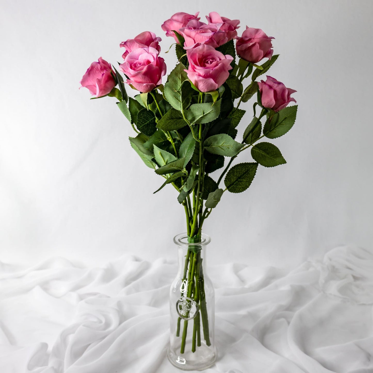 artificial Pink Real Touch Half Bloom Roses closer look in glass vase