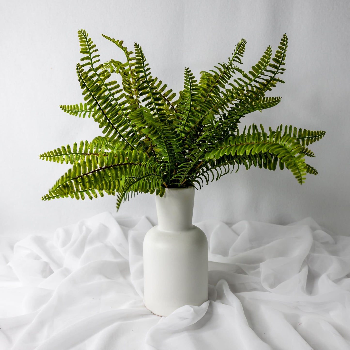 artificial Fishbone Fern in white vase
