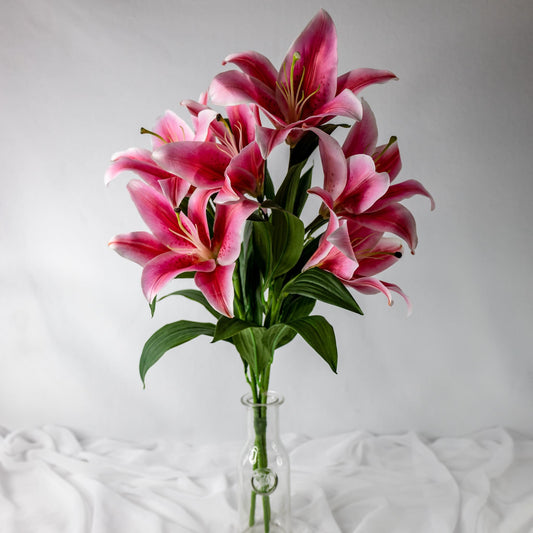 artificial Dark Pink Oriental Lilies in glass vase