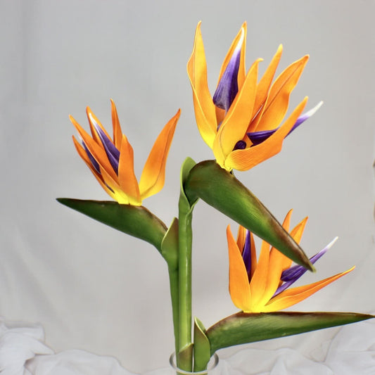 artificial Bird of Paradise in glass vase