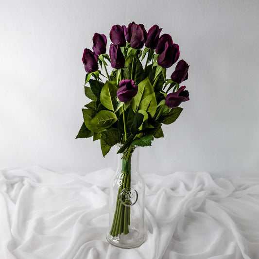 artificial Aubergine Real Touch Rose Buds in glass vase