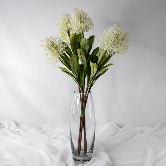 artificial White Leucospermum in glass vase